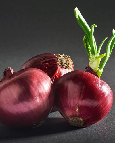 red-onions-whole-isolated-black